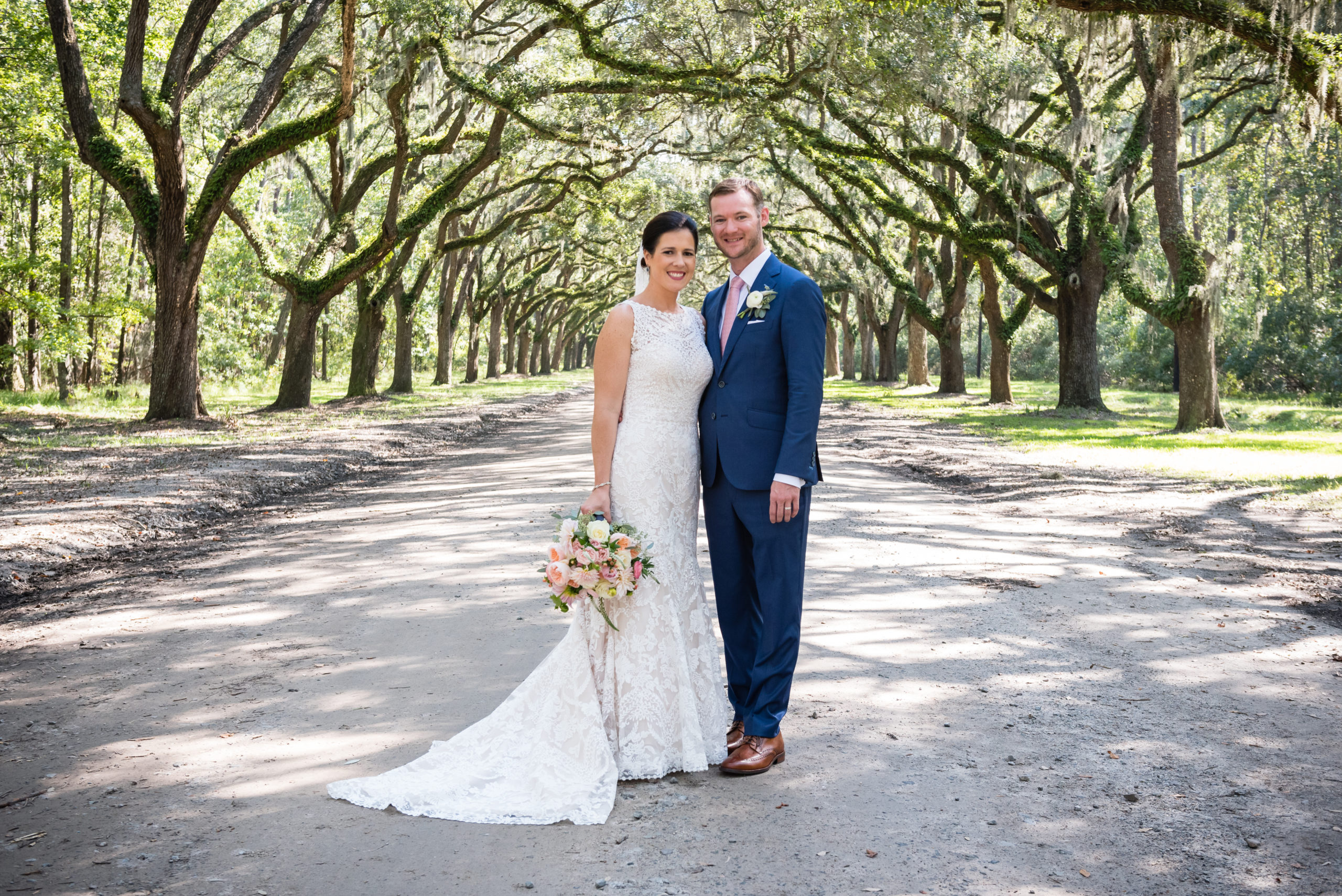 Wedding client wearing blue suit