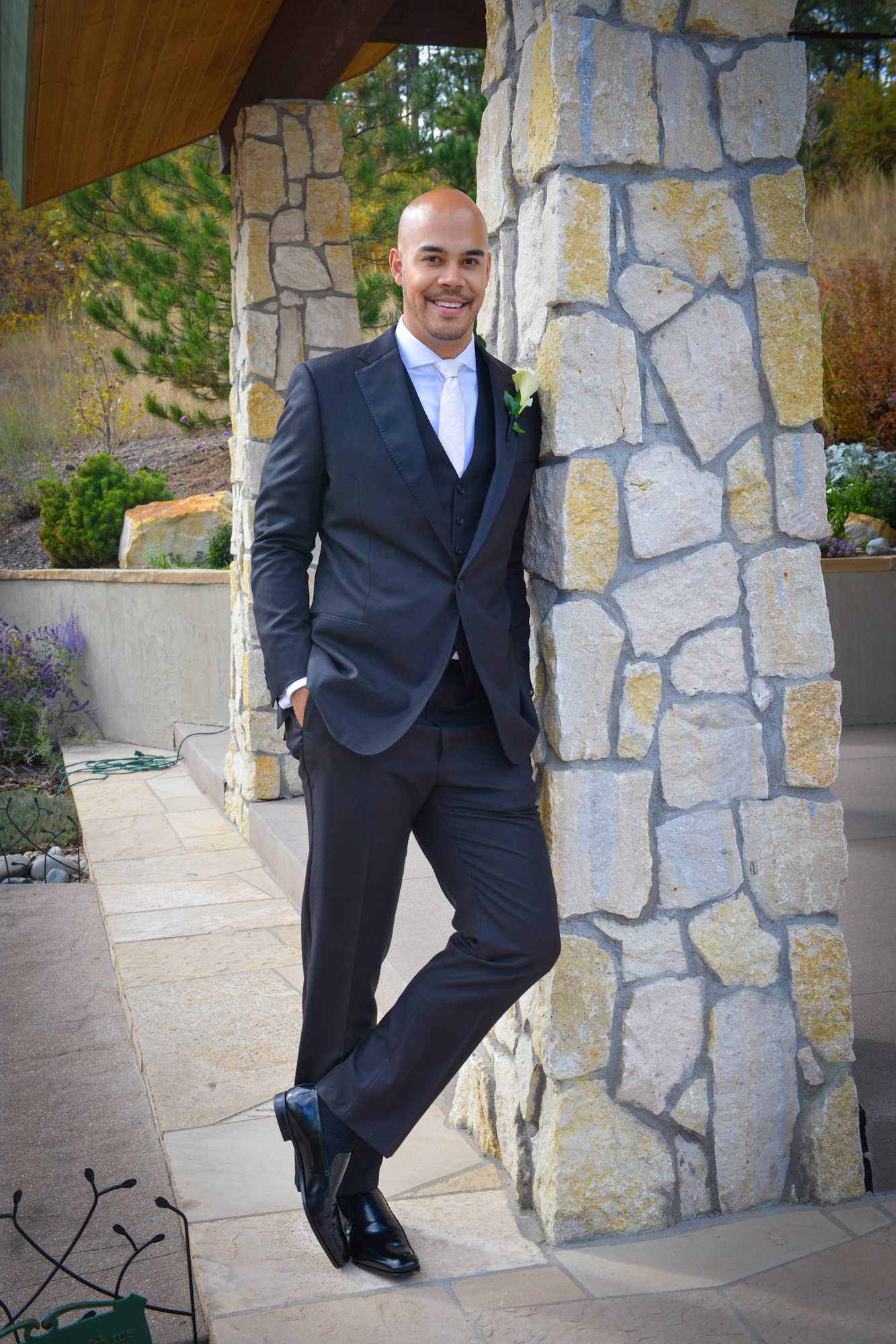 wedding client in a black 3 piece tuxedo