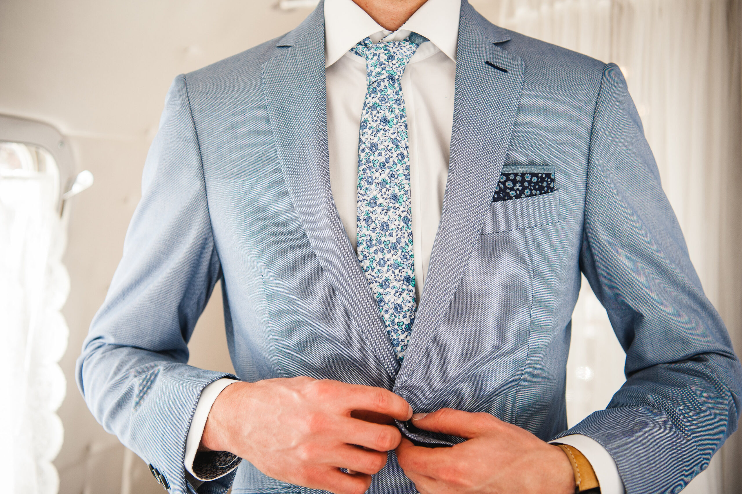 wedding client in blue suit